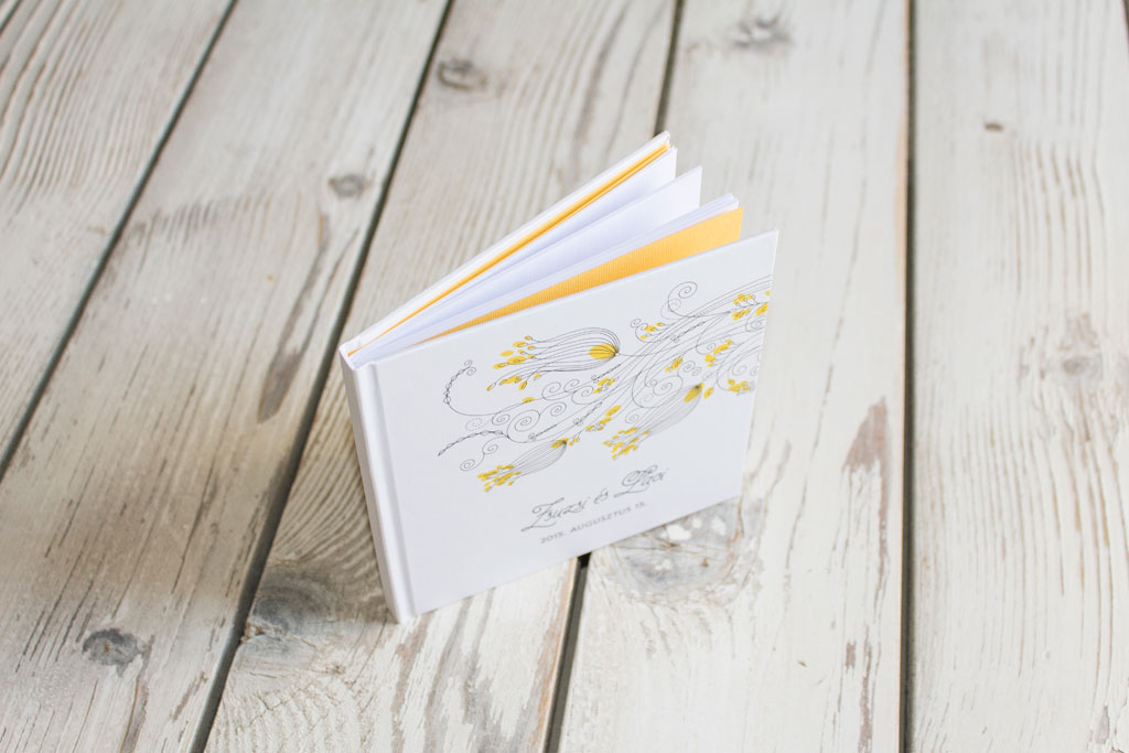 Vonalrajzos sárga virágos emlékkönyv kézzel készítve keménytáblás egyedi borító, színes vagy nyomtatott előzék, többféle méret és terjedelem